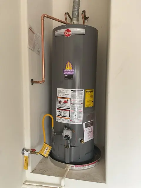 A gas water heater serviced by Trident Plumbing
