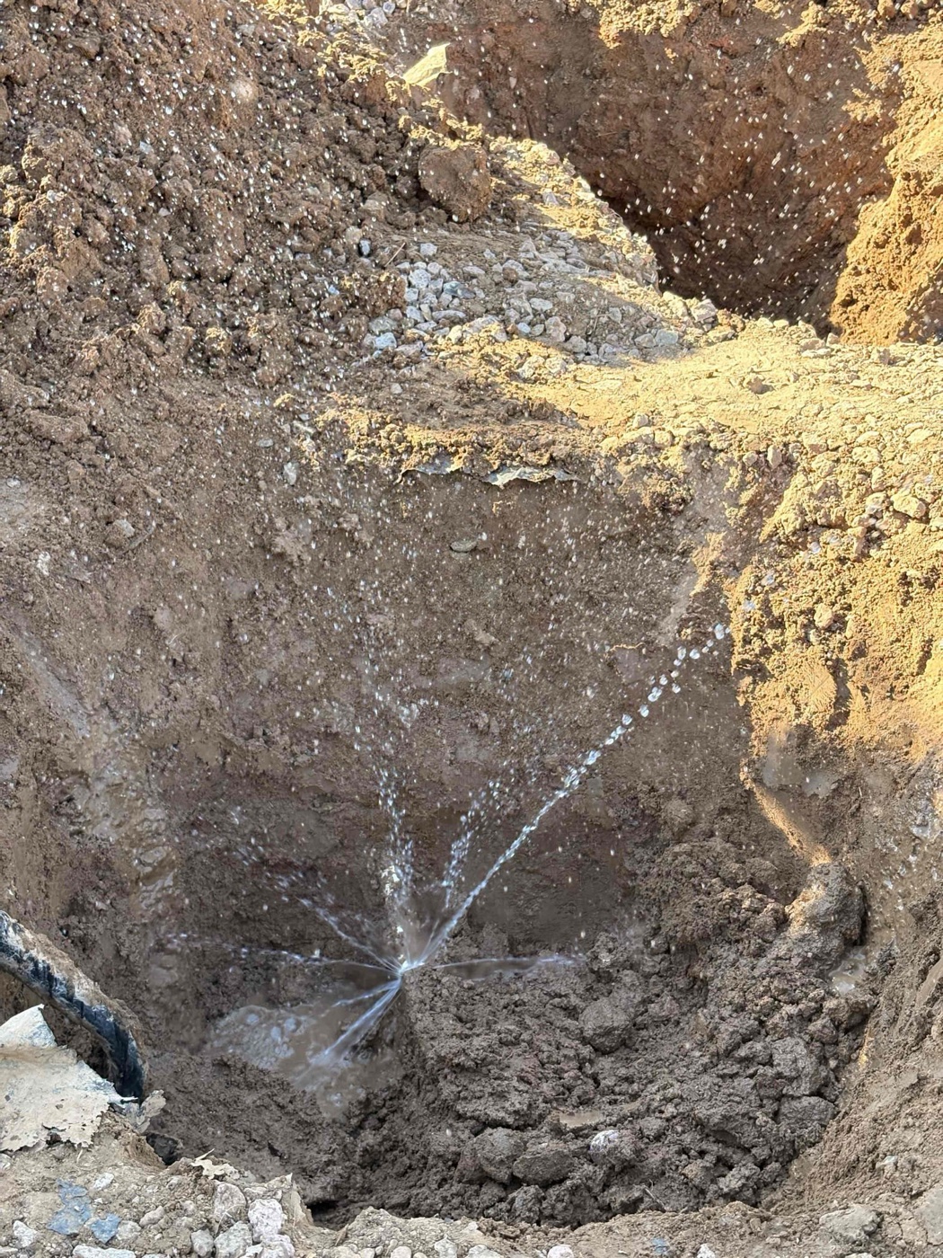 Failed water main line — visible break that necessitated replacement