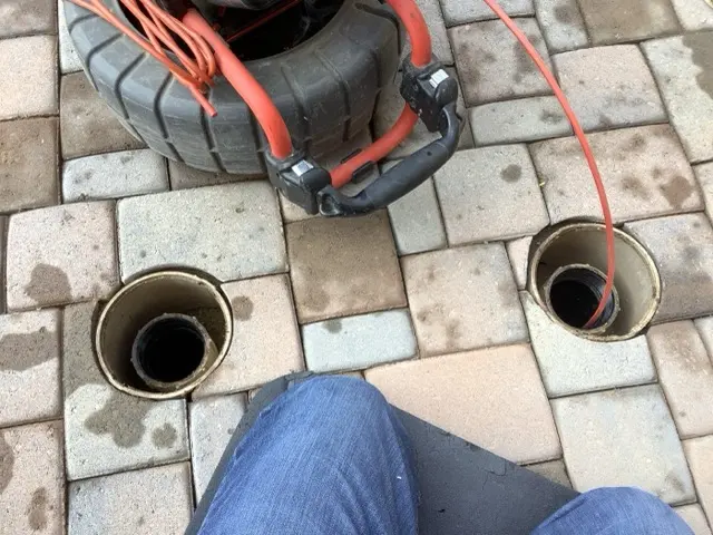Camera inspection reel used to diagnose a drain blockage