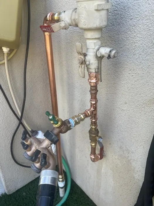 Fresh copper repiping and a backflow assembly, from Kelly Weiss's Google review